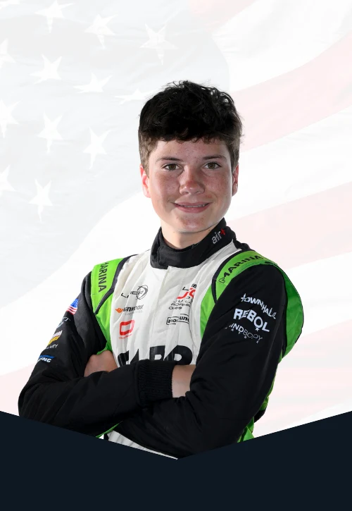 Cash Felber in FLBR Motorsport race suits with an American flag backdrop.